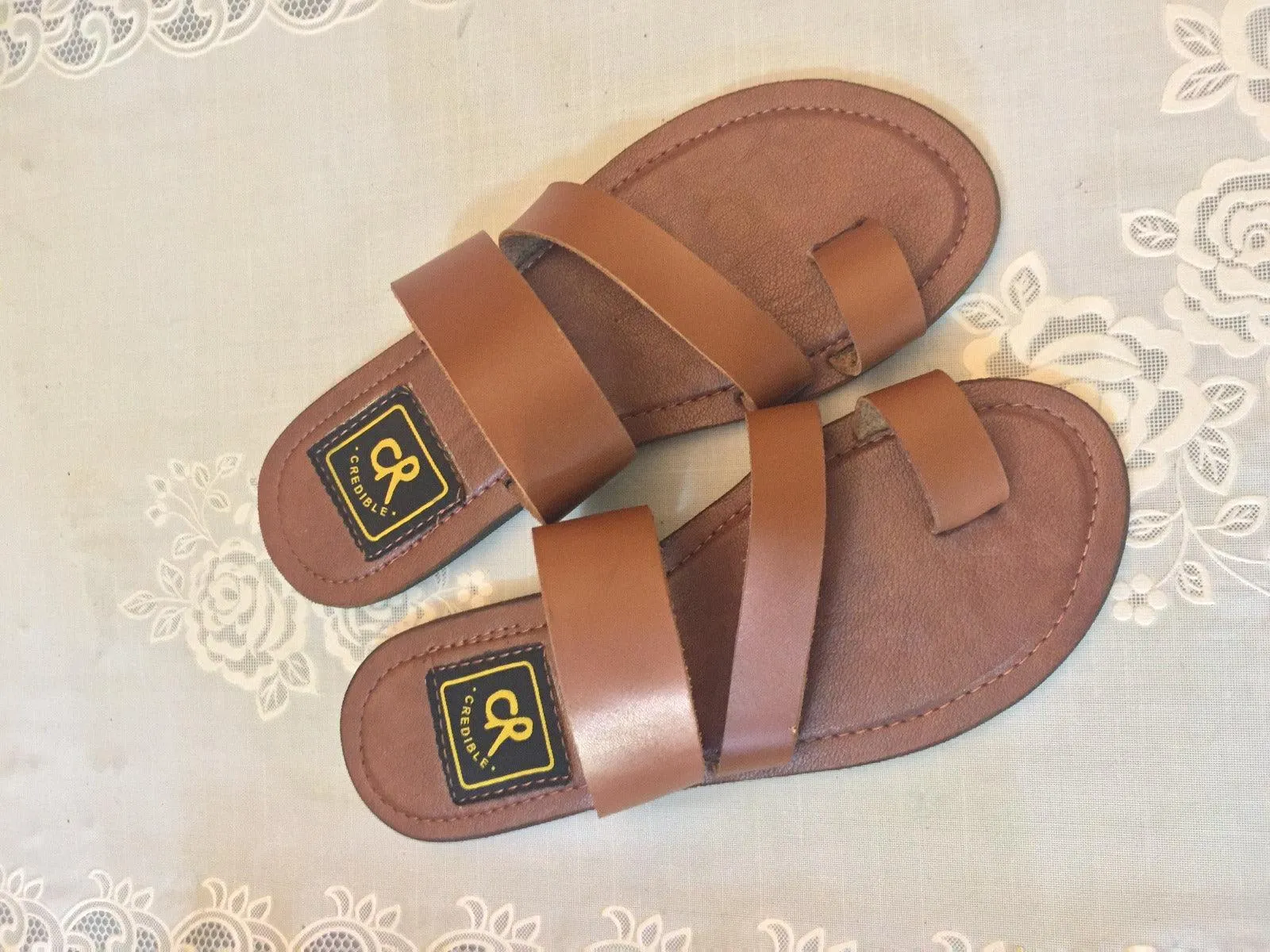 Tan Strapped Credible Ring Slippers